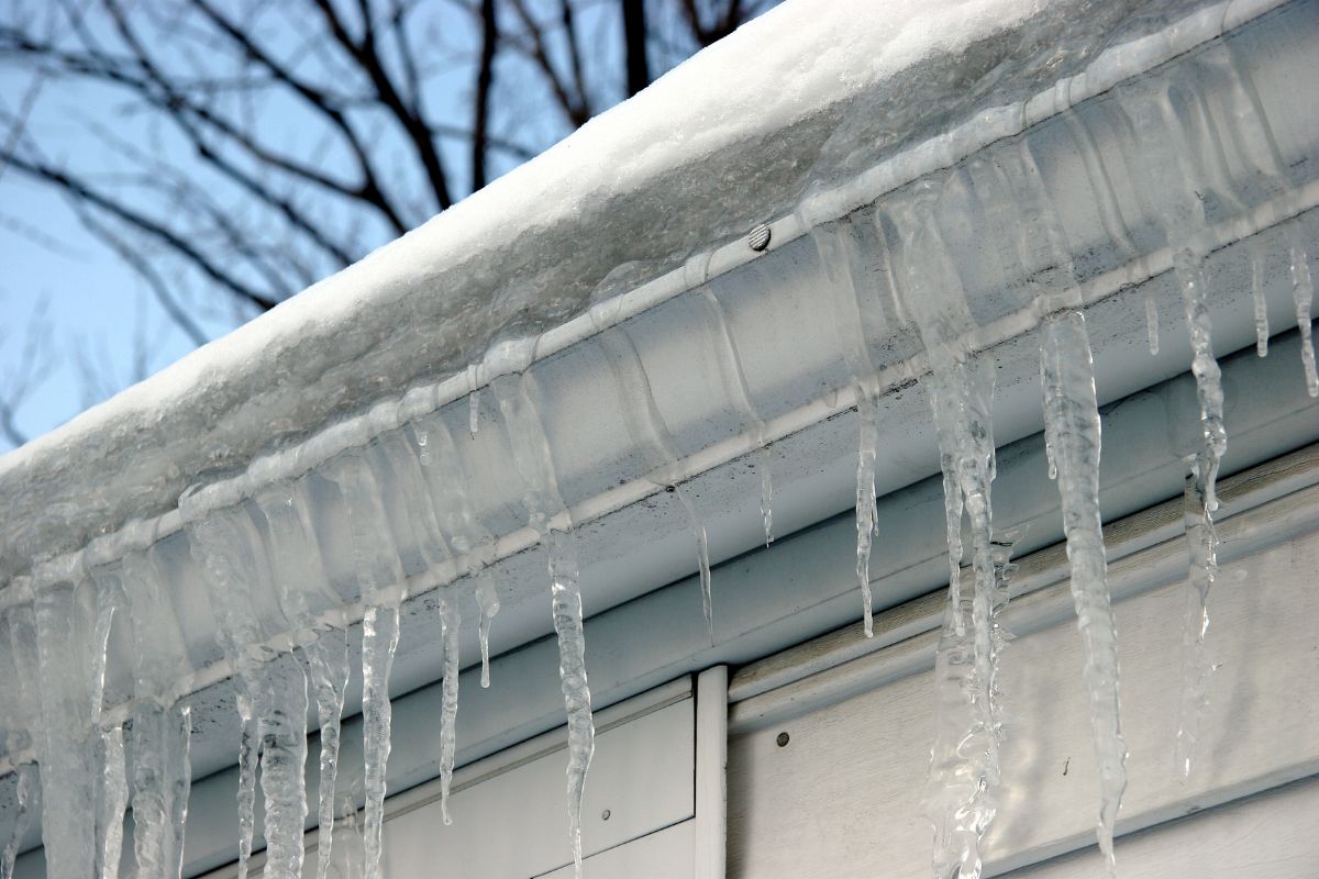 ice dams and icicles on house