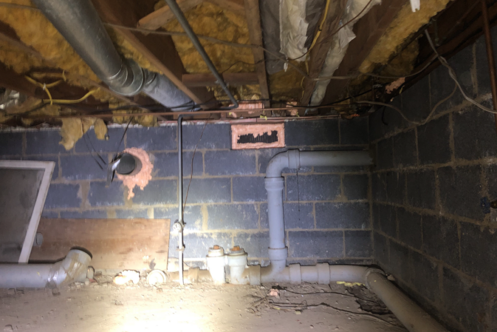 dirty damp crawl space