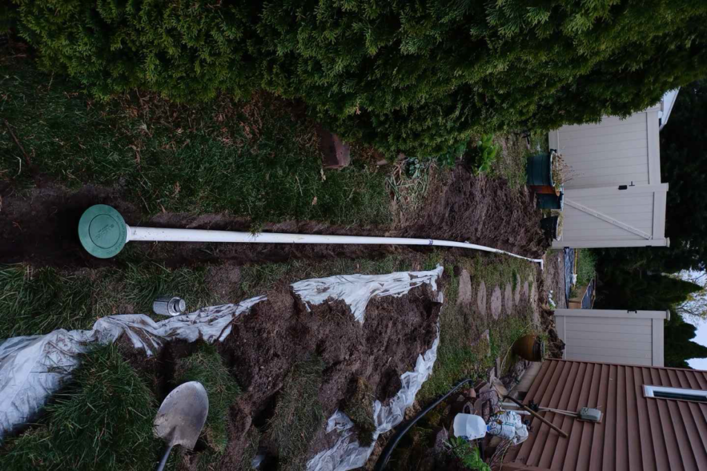 french drain installation to combat poor yard drainage