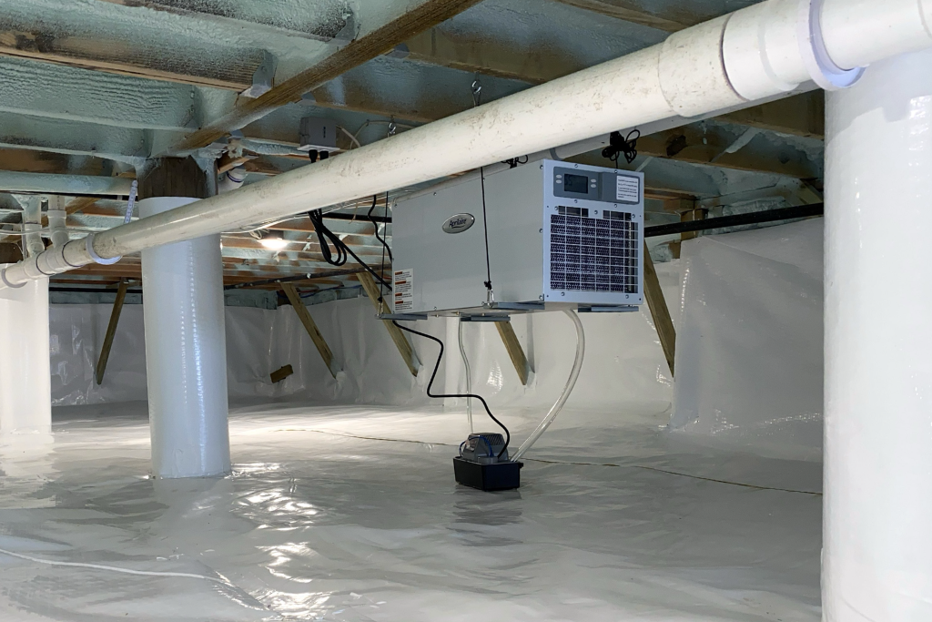 dehumidifier installed in crawlspace to help address crawlspace odors